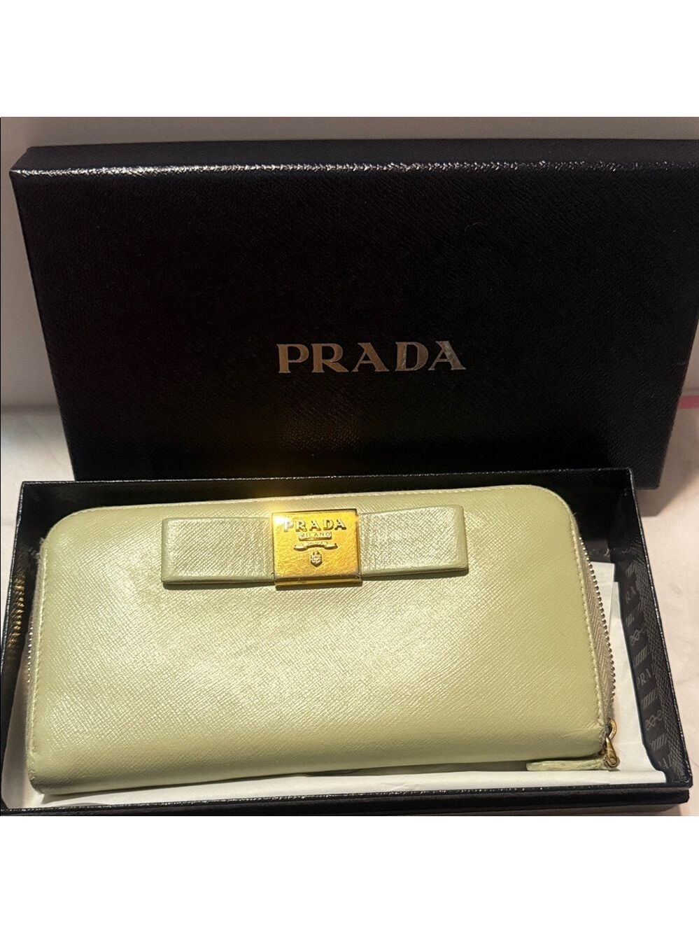 Prada Light Green Saffiano Leather Zip Around Wallet with Bow Accent